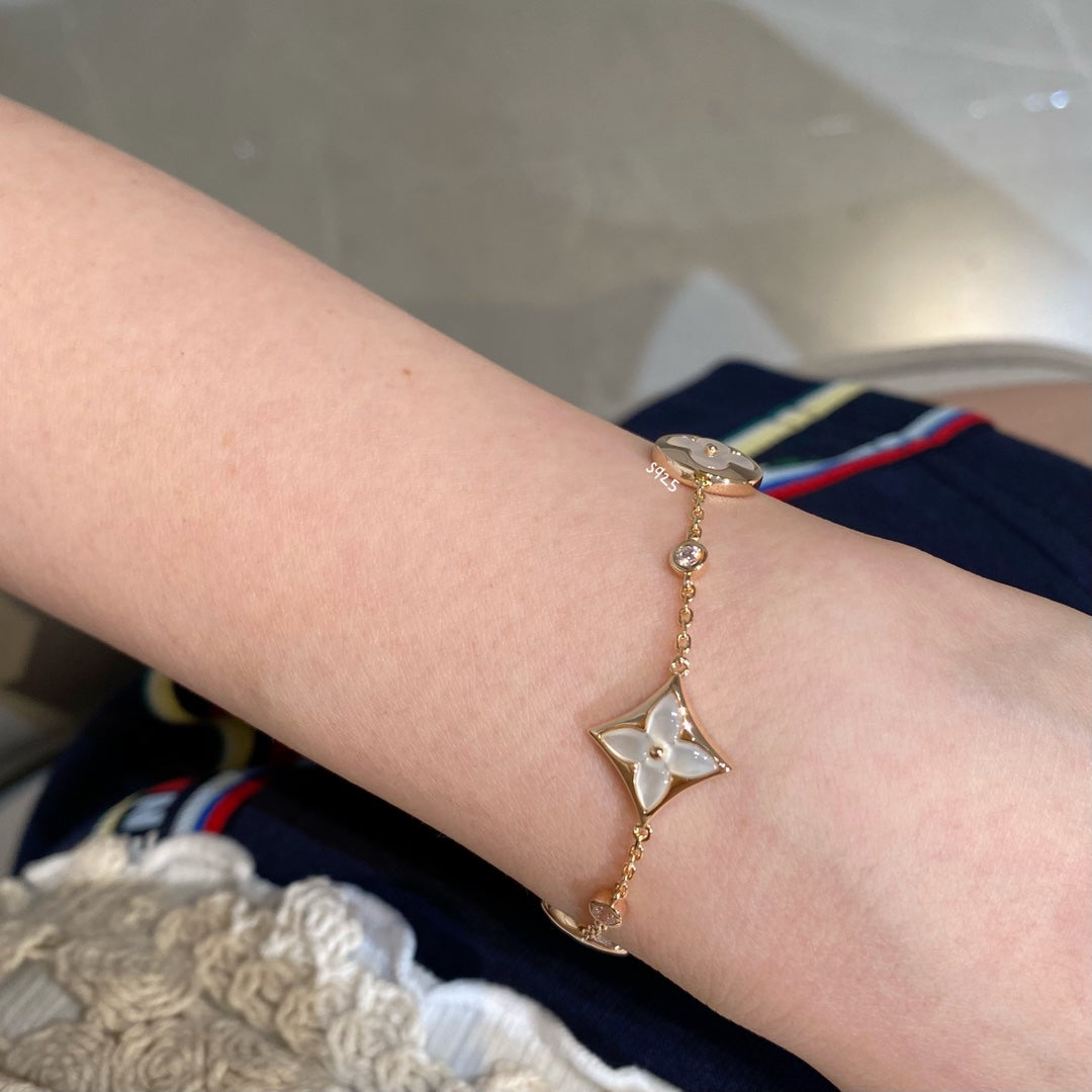 [Basjewels]STAR AND SUN 4 MOTIF WHITE MOP PINK GOLD BRACELET